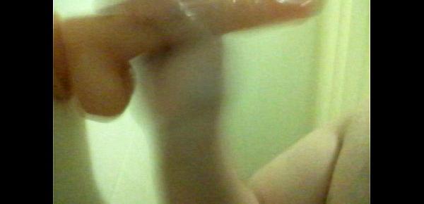  Fat faggot deepthroats dildo in shower